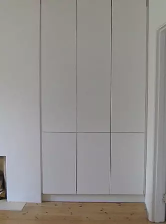 Built-in cupboards with push release doors